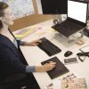 High angle view of photo editor working at desk