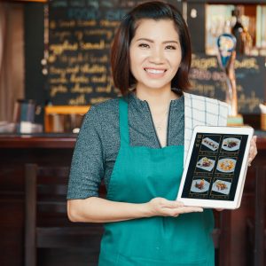 Waitress showing menu